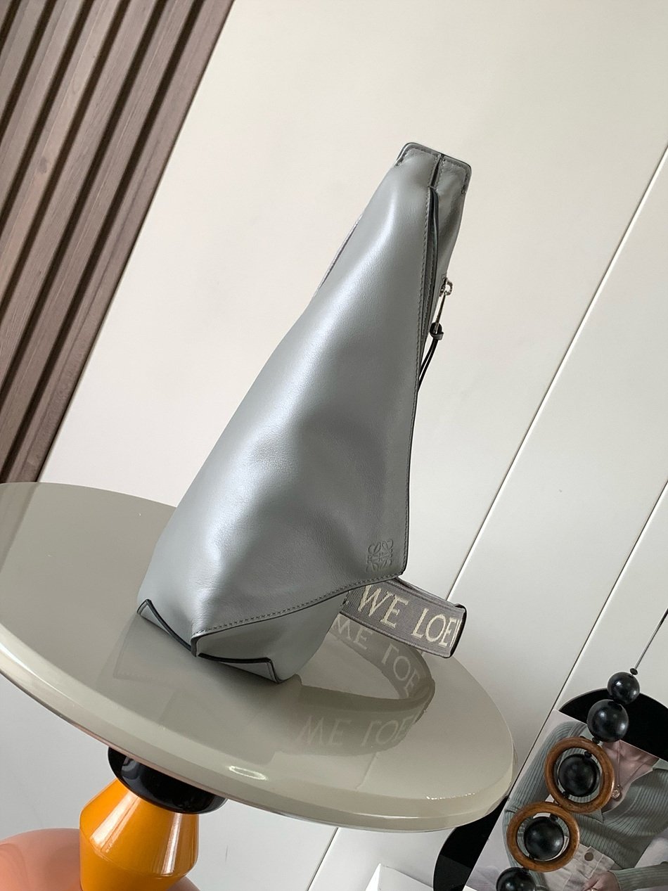 LOEWE Soft and smooth cow leather and jacquard Anton Sling handbag B511A